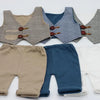 A set of newborn photography outfits featuring plaid vests and matching beige, navy blue, and white bottoms.