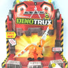A Dinotrux toy car featuring an orange dinosaur figure named Skya on a cardboard box.