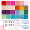 A variety of colored glass seed beads in various shades are displayed in a storage tray alongside jewelry making tools and pa