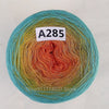 A ball of A285 rainbow gradient mercerized cotton cake yarn