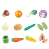 A set of magnetic wooden fruit and vegetable cutting toys including a pumpkin, squash, cucumber, carrot, and lettuce.