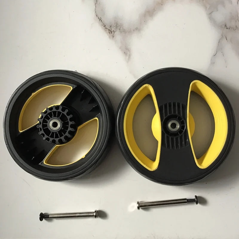 A black circular product kit with yellow accents is shown next to two metal rods.