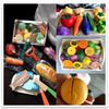 A wooden magnetic fruit and vegetable cutting play set showing various colorful fruits and vegetables.