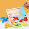 A wooden tangram puzzle board with various blue, red, and yellow shapes including fish, turtles, and starfish.