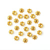 A collection of small, gold-colored Tibetan style hollow flower bead caps for jewelry making.
