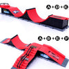 Finger skateboard park set featuring red ramps and black boards with various components.