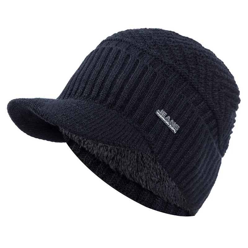 Black cozy fleece-lined knit beanie with a brim shown from the side.
