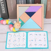 A wooden sensory block set featuring colorful geometric shapes and a music rattle toy.