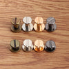 A collection of decorative heart brass rivets for leather craft and DIY projects.