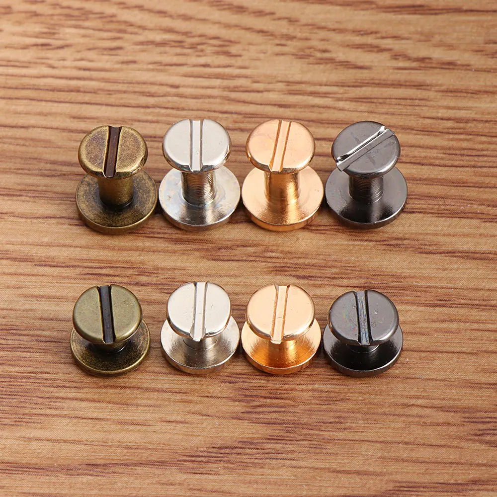 A collection of decorative heart brass rivets for leather craft and DIY projects.