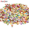 Assortment of colorful soft polymer clay slices for nail art and DIY crafts