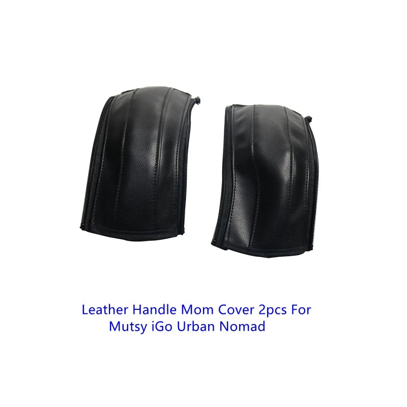 Two black leather handle covers for the Mutsy iGo Urban Nomad stroller.