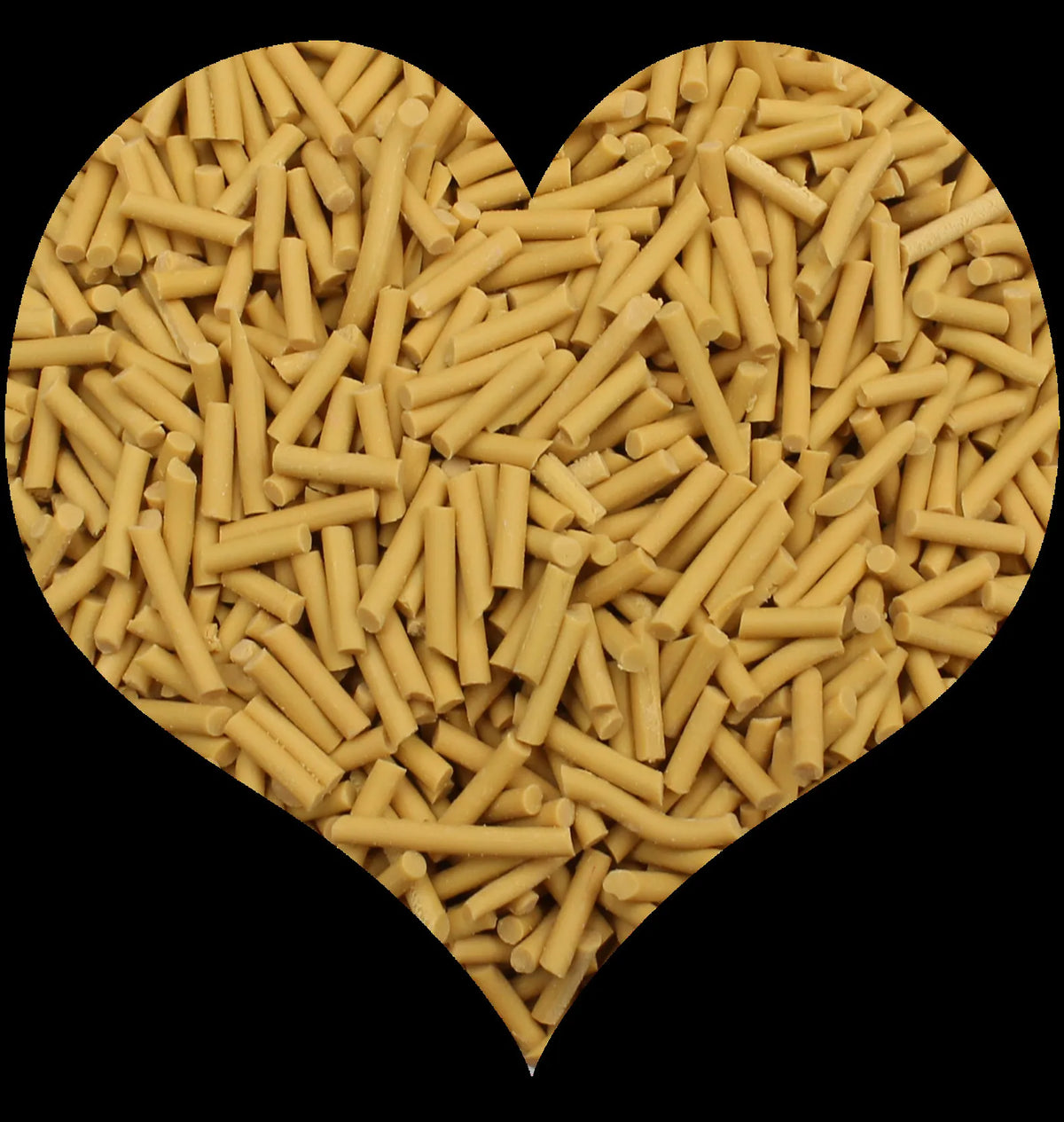A heart shape filled with light yellow cylindrical polymer clay candy sprinkles for cake decorating