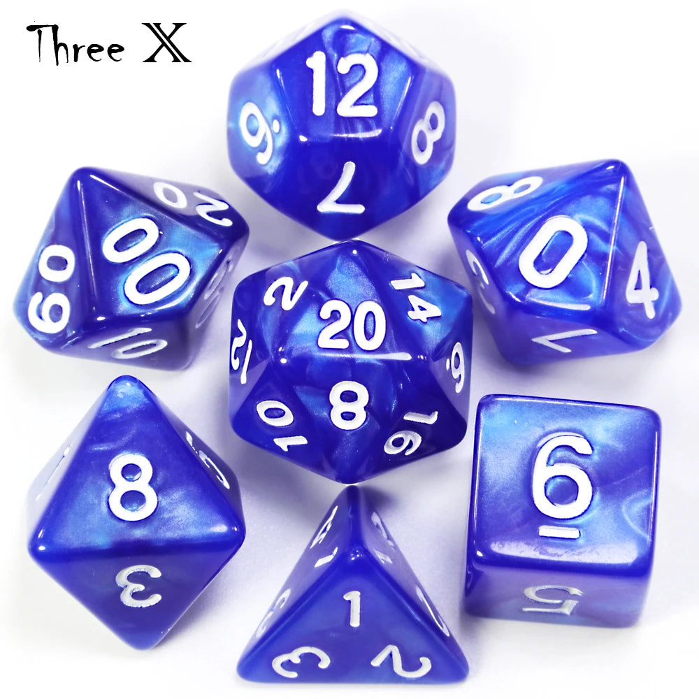 A set of blue marble effect polyhedral dice including a dodecahedron, tetrahedron, and cube.