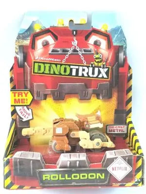 A Dinotrux dinosaur truck toy car with removable dinosaur figures displayed in its packaging.