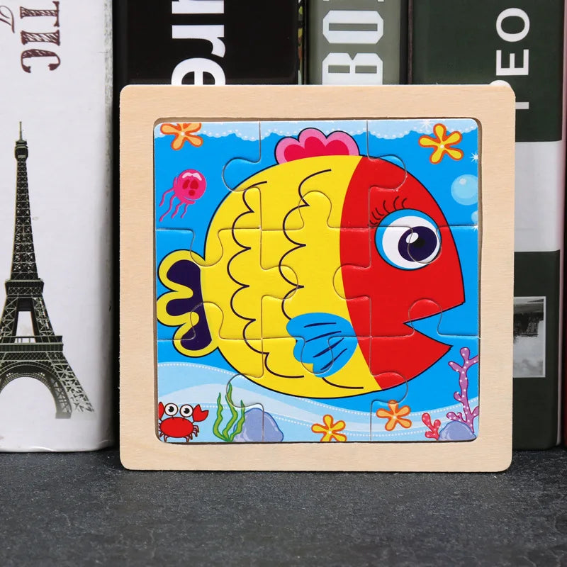 A wooden tangram puzzle featuring a colorful fish design with yellow, red, and blue elements.