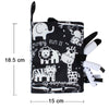 A black cloth book featuring various white animal illustrations like an elephant, lion, giraffe, and zebra, designed for baby