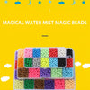 A collection of colorful magic water beads in various shades and sizes displayed in a clear plastic container.