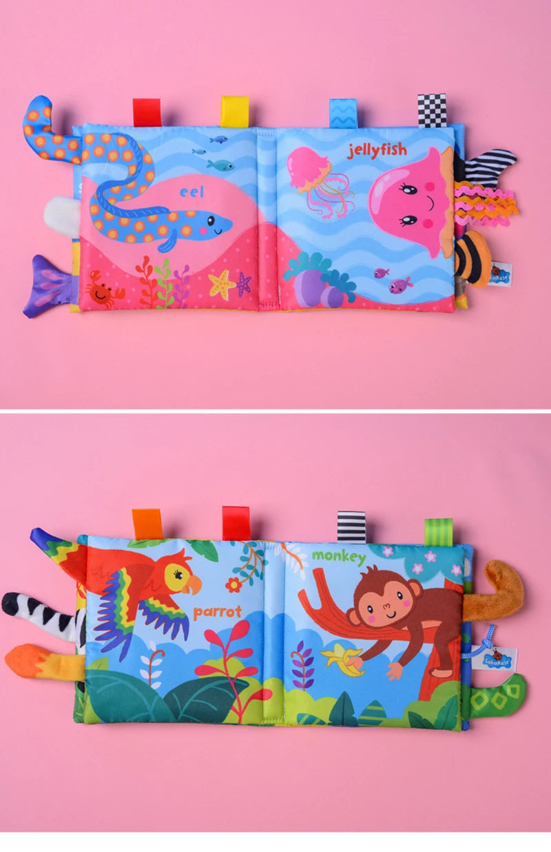 A colorful cloth book featuring sea animals like eel and jellyfish, and a parrot on a pink background.