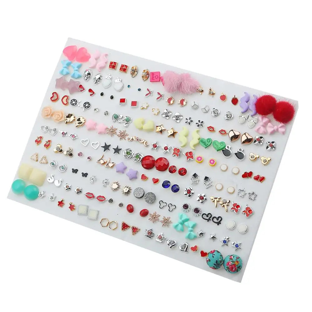 A collection of assorted acrylic stud earrings featuring hearts, stars, and moons in various colors and styles.