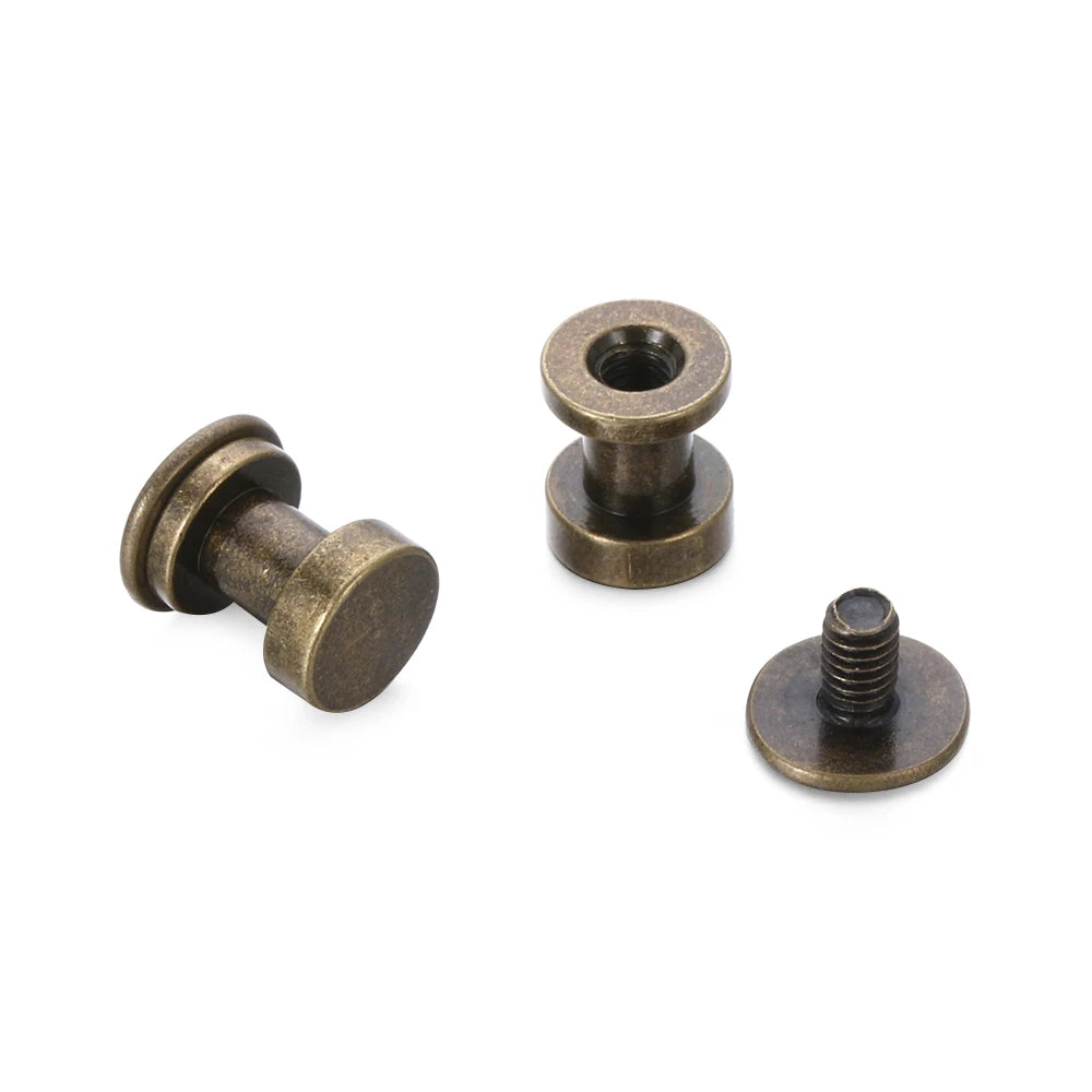 A set of decorative heart brass rivets for leather craft and DIY projects.