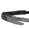 Black PU leather guitar strap with metal studs and leather accents.