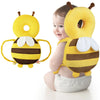 Sac à dos de protection en forme d'abeille jaune pour bébé, avec des rayures noires et des ailes blanches.