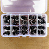 A clear plastic box containing multiple colorful safety eyes for dolls and amigurumi