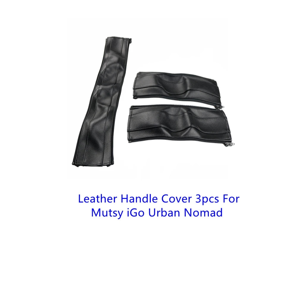 Three pieces of black leather handle covers for the Mutsy iGo Urban Nomad stroller.