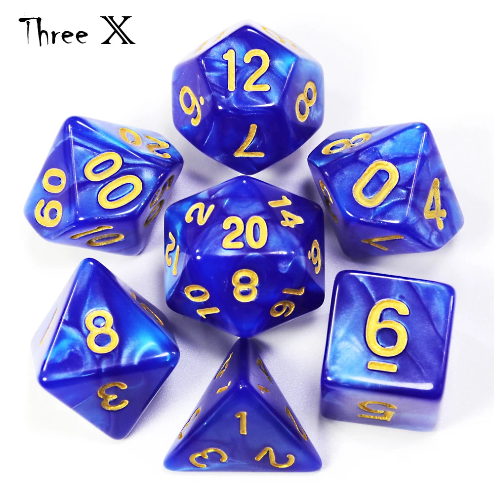 A set of blue marble effect polyhedral dice including a dodecahedron, tetrahedron, and cube.
