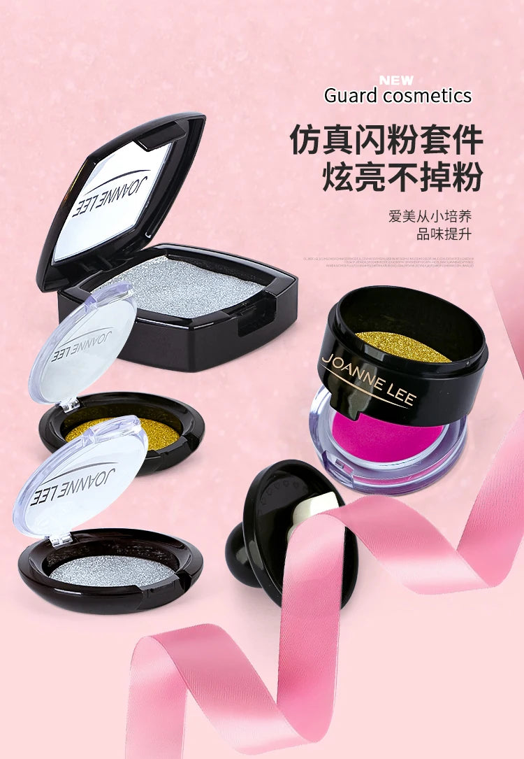A collection of Joann Lee cosmetics including eyeshadow palettes and lip products displayed on a pink background.