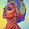 A close-up portrait of an African woman wearing a colorful headwrap, looking to the side.