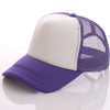 A purple and white trucker hat with a mesh back and a curved brim is shown on a reflective surface.