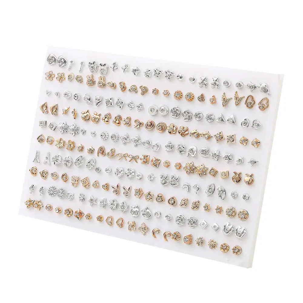 A display of assorted acrylic stud earrings including hearts, stars, and moons.