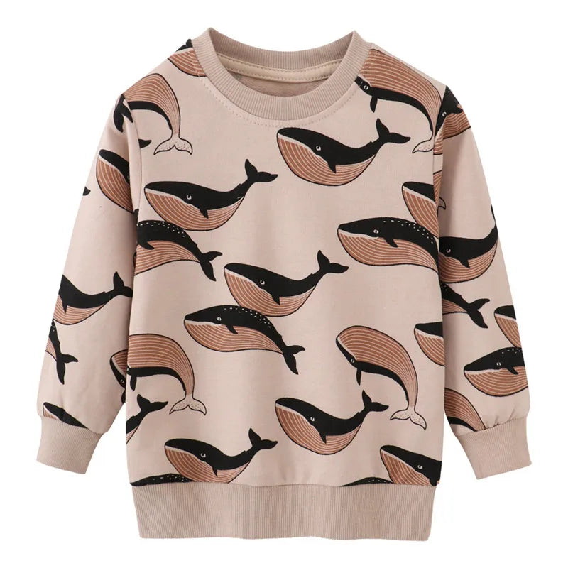 A light pink kids cotton long sleeve pullover sweatshirt featuring a black whale print.