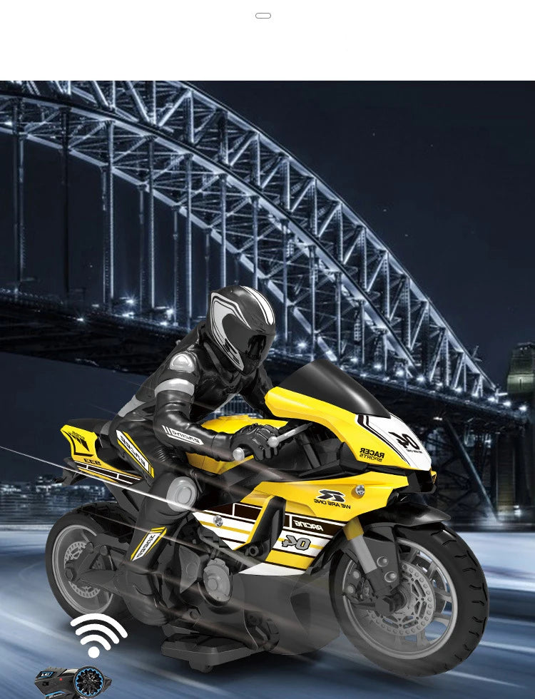 A yellow and black 1:10 scale remote control stunt motorcycle is shown in motion against a nighttime cityscape backdrop.