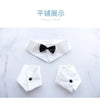A display of a white shirt and bow tie for a cosplay costume set.