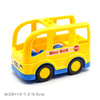 A yellow mini bus toy vehicle with blue accents and a trailer, designed for city traffic building blocks.