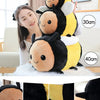A plush toy resembling a bee and ladybug, featuring black and yellow colors, displayed with size measurements.