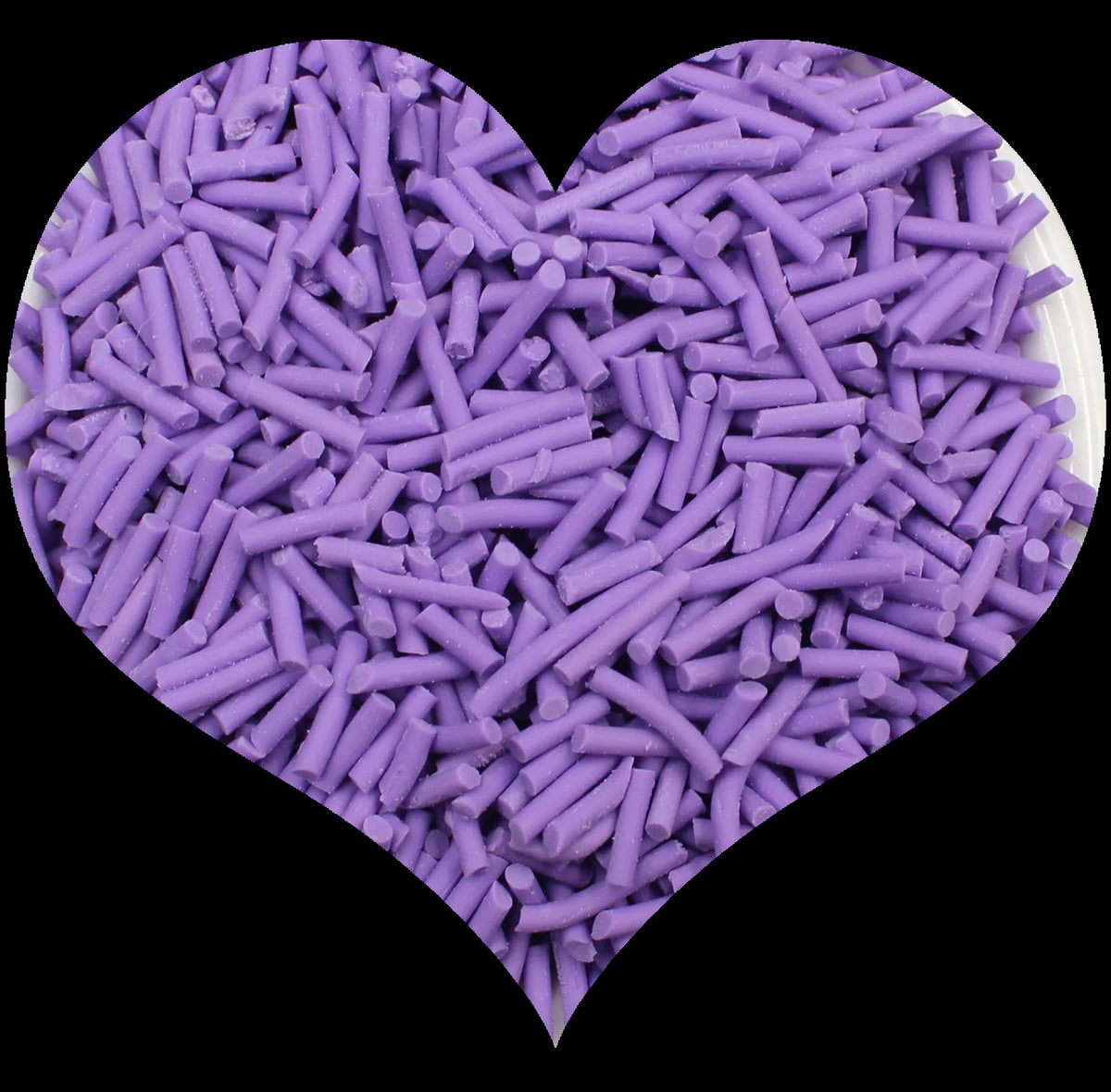 A heart shape filled with purple soft polymer clay candy sprinkles for cake decorating