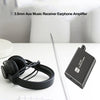 A black portable HiFi headphone amplifier with a rechargeable battery is shown next to a pair of headphones.