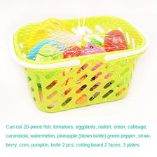 A yellow plastic cutting board filled with pretend play food like fish, tomatoes, and vegetables for children.
