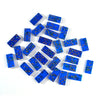 A collection of small blue domino tiles arranged in a pyramid shape.