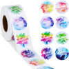 Roll of colorful round thank you stickers in various shades of pink, purple, blue, and green