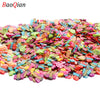 Assortment of colorful soft polymer clay slices for nail art and DIY crafts