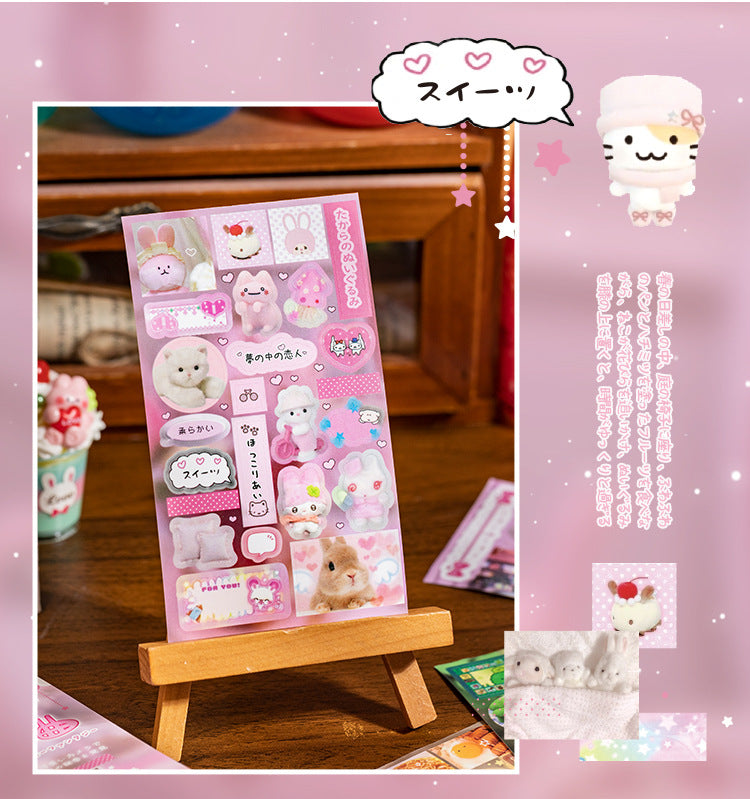 A display of Sweet Dream Duet stickers featuring cute, pastel-colored characters and designs on a wooden stand.