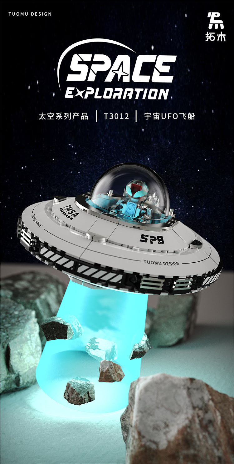 A model spaceship built from blocks, resembling a UFO, is displayed floating above a clear blue liquid.