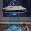 A model of a spaceship built from LEGO bricks, featuring a clear dome and illuminated details.