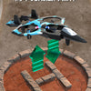 A black and blue stunt glider is shown above a circular base, illustrating the simple operation of a 360° roll maneuver.
