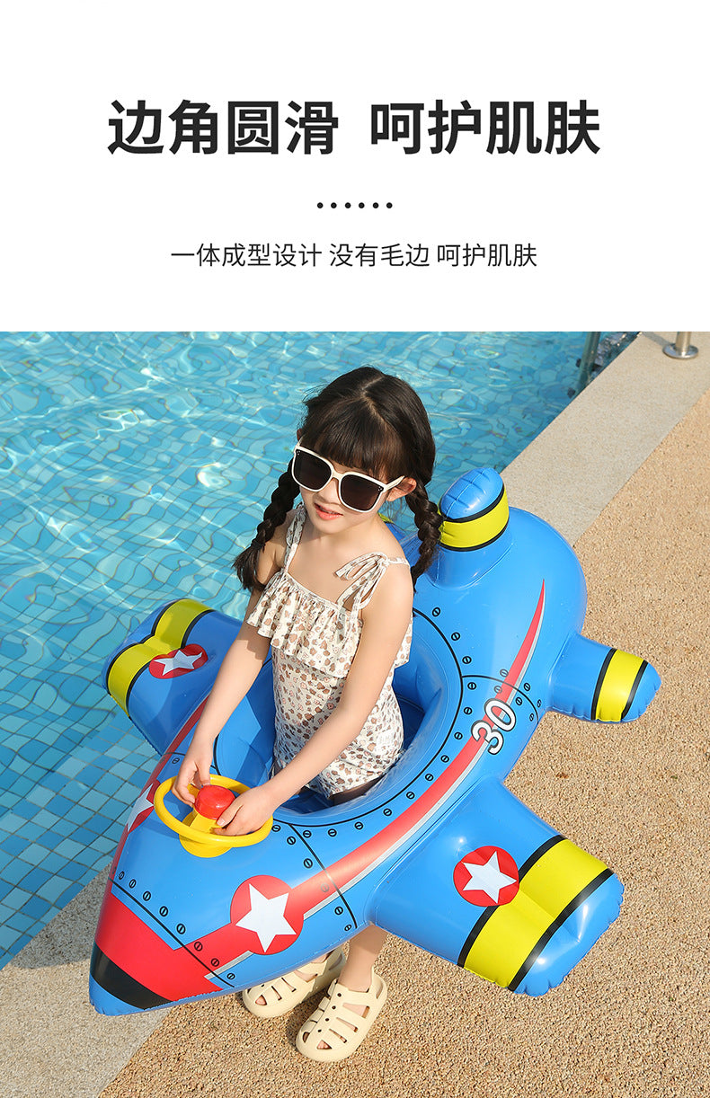 A child is sitting in a blue inflatable aircraft swim ring designed for protection.